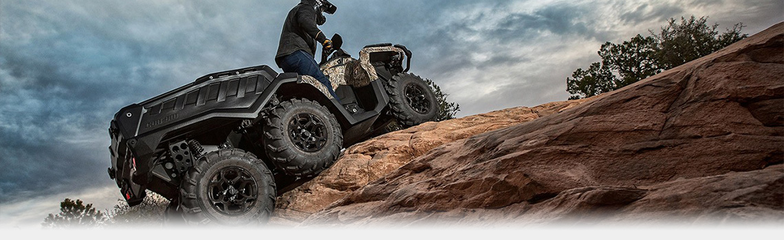 2017 Can Am ATV Illinois An ATV climbing a hill